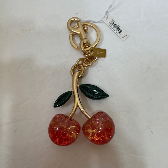 Coach Handbags - NEW WITH TAGS COACH SIGNATURE CHERRY BAG CHARM PINK
